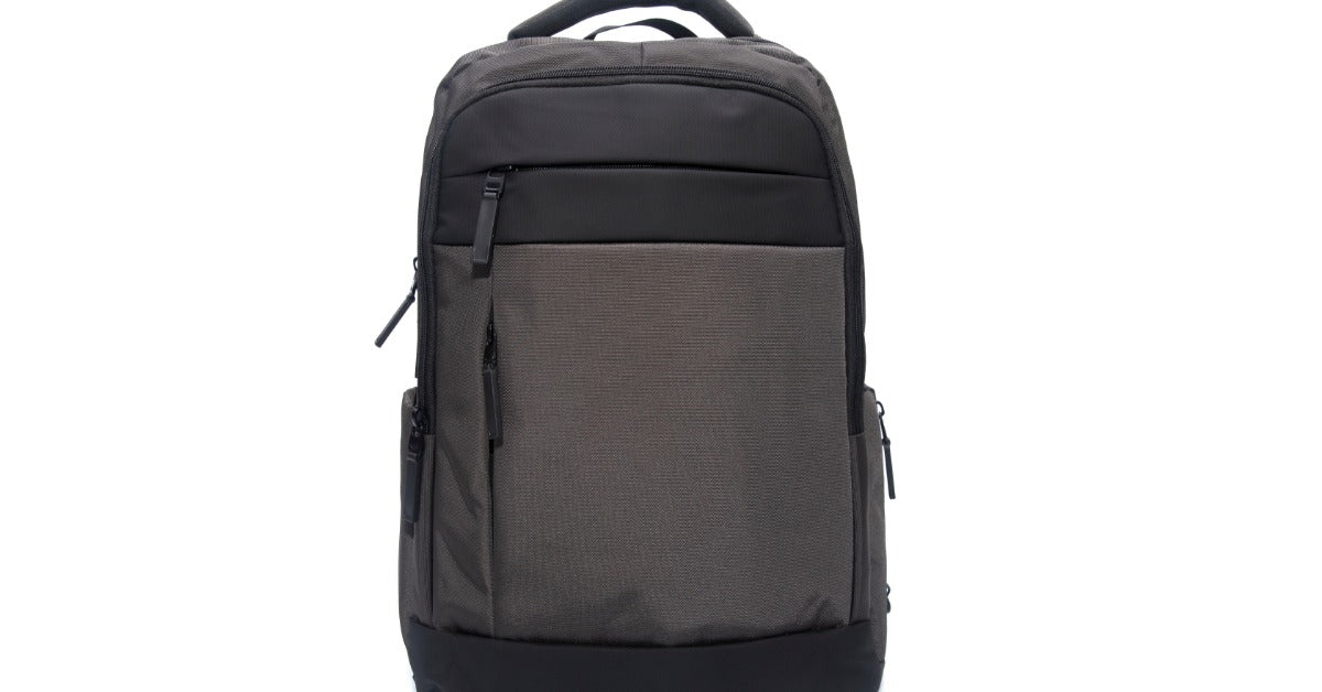 A dark brown backpack is shown from the front on a plain white background with straps and pockets visible.